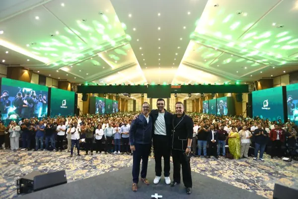 Speakers on stage in front of a packed hall at Proficorn 2026