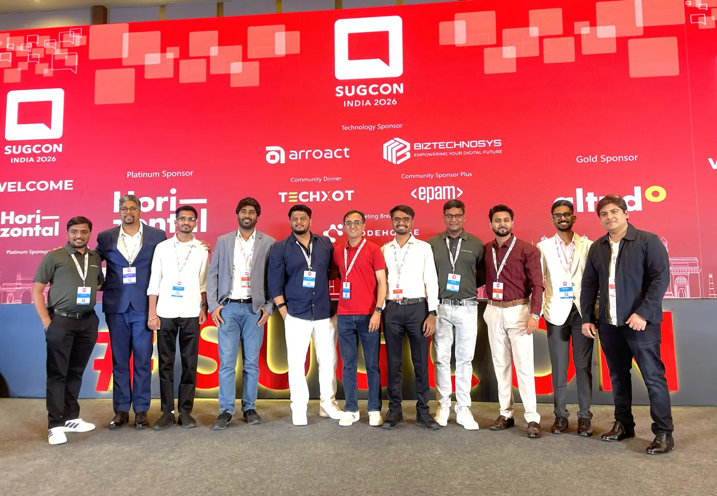 A group of Sitecore community members on stage at SUGCON India 2026