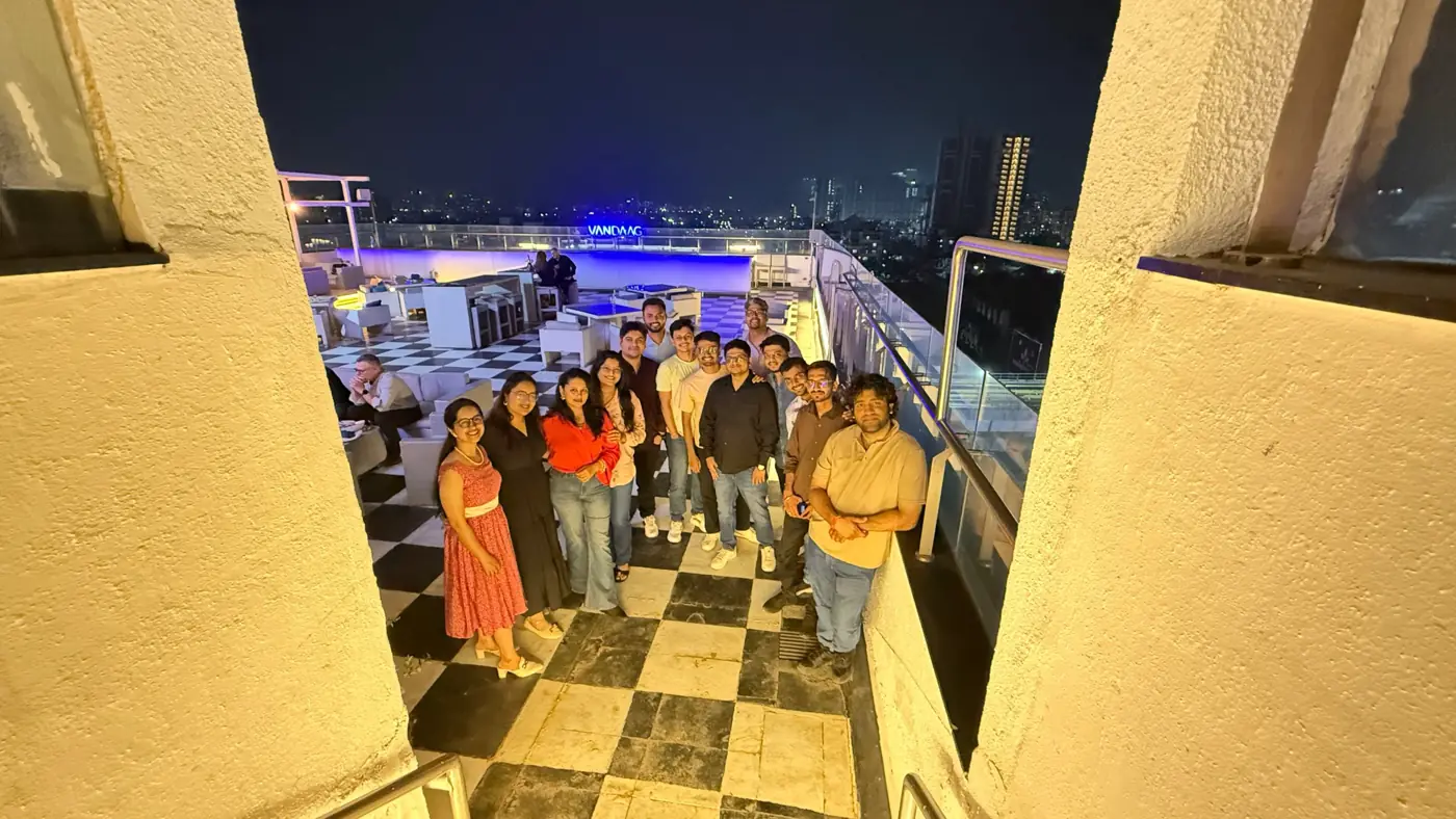 The Digiteins team together on a rooftop terrace in Pune at night